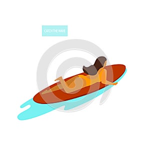 Young woman surfer lying on a surfboard swimming in the sea