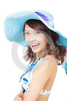 Young woman swear bikini suit and a sun hat