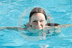 Young woman in a swimming pool