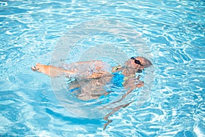 Young woman in a swimming pool