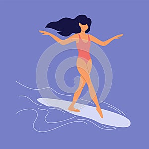 Young woman in swimsuit surfing on longboard
