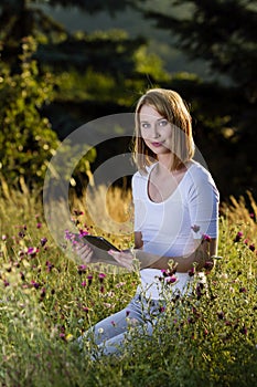 Young woman with tablet PC