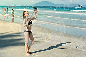 Young woman taking selfie with smartphone