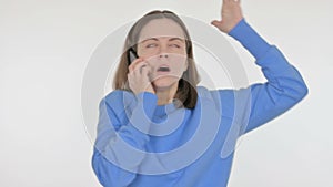 Young Woman Talking Angry on Phone on White Background