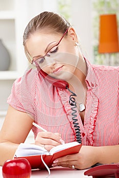 Young woman talking on phone