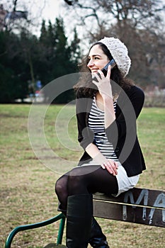 Young woman talking on the phone