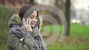 Young woman talking on the phone