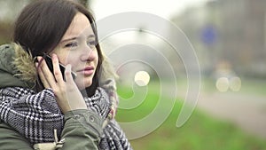 Young woman talking on the phone