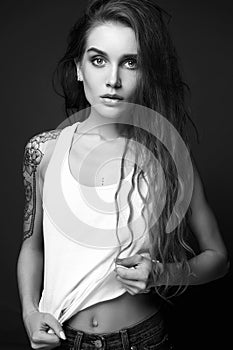 Young Woman with Tattoo. monochrome