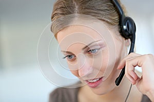Young woman teleoperator at work