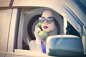 Young woman with telephone