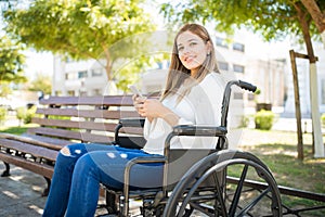 Young woman texting on her phone