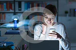 Young woman texting with a smart phone