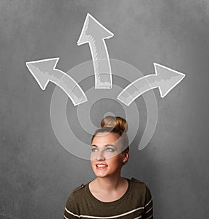 Young woman thinking with arrows above her head