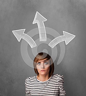 Young woman thinking with arrows above her head