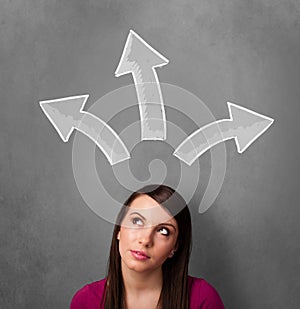 Young woman thinking with arrows above her head