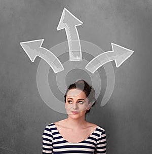 Young woman thinking with arrows above her head