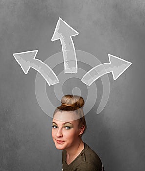 Young woman thinking with arrows above her head