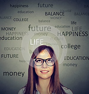 Young woman thinking contemplating about future life