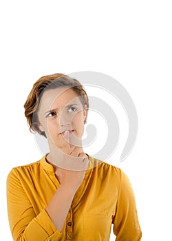 Young Woman Thinking. Finger on lips looking up. Isolated