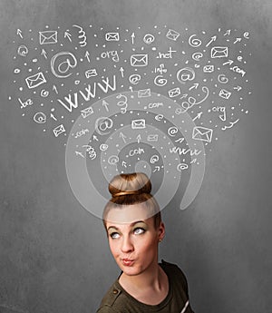 Young woman thinking with social network icons above her head