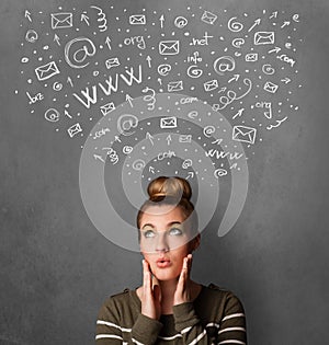 Young woman thinking with social network icons above her head