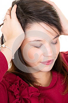 Young woman thinking and stressed hands on head