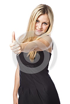 Young woman with thumbs up with a laughing