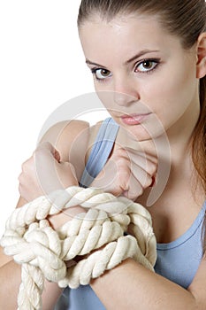 Young woman with tied up hands