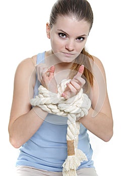 Young woman with tied up hands