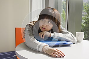 Young woman tired with work