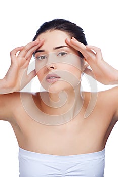 Young Woman Touching Her Face