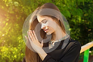 Young woman touching her hair