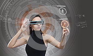 Woman touching the virtual future interface