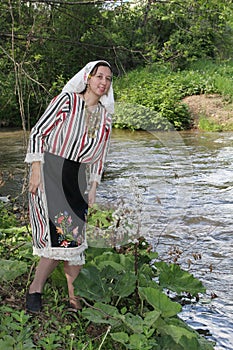 A young woman in traditional Bulgarian folklore costume