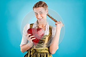 Young woman in traditional clothes - dirndl or tracht