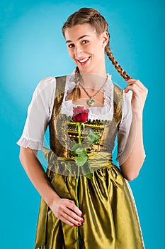 Young woman in traditional clothes - dirndl or tracht