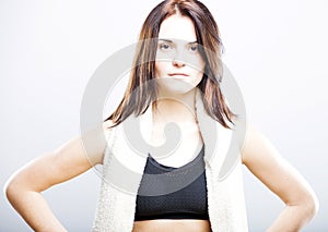 Young woman after training in sport bra with towel