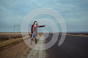 Young woman travel with hitch-hiking