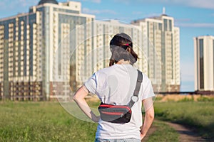 young woman traveler in the fields