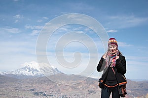 Young woman traveler with panorama of La Paz
