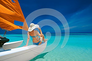 Young woman traveling by boat