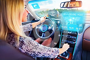 Young woman traveling in self driving car
