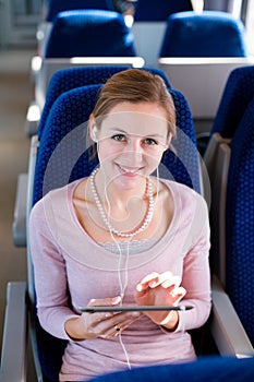 Young woman traveling by train