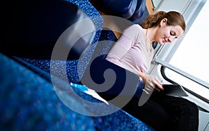 Young woman traveling by train