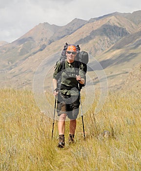Young woman trekking in mountain