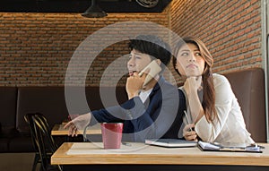 Young woman trying to listen gossip/Curious Girl Listening to Her Boyfriend Talking on The Phone