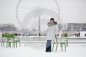 Young woman in Tuileries garden on a winter day