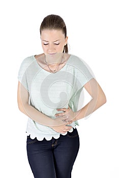Young woman with tummy ache photo