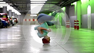 Young woman turns his head in the garage.